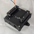 Black electronic enclosure with labeled status LED ports on a white background